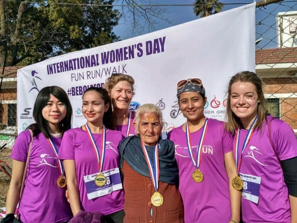 Finishers with their medals at the International Women’s Day fun run
