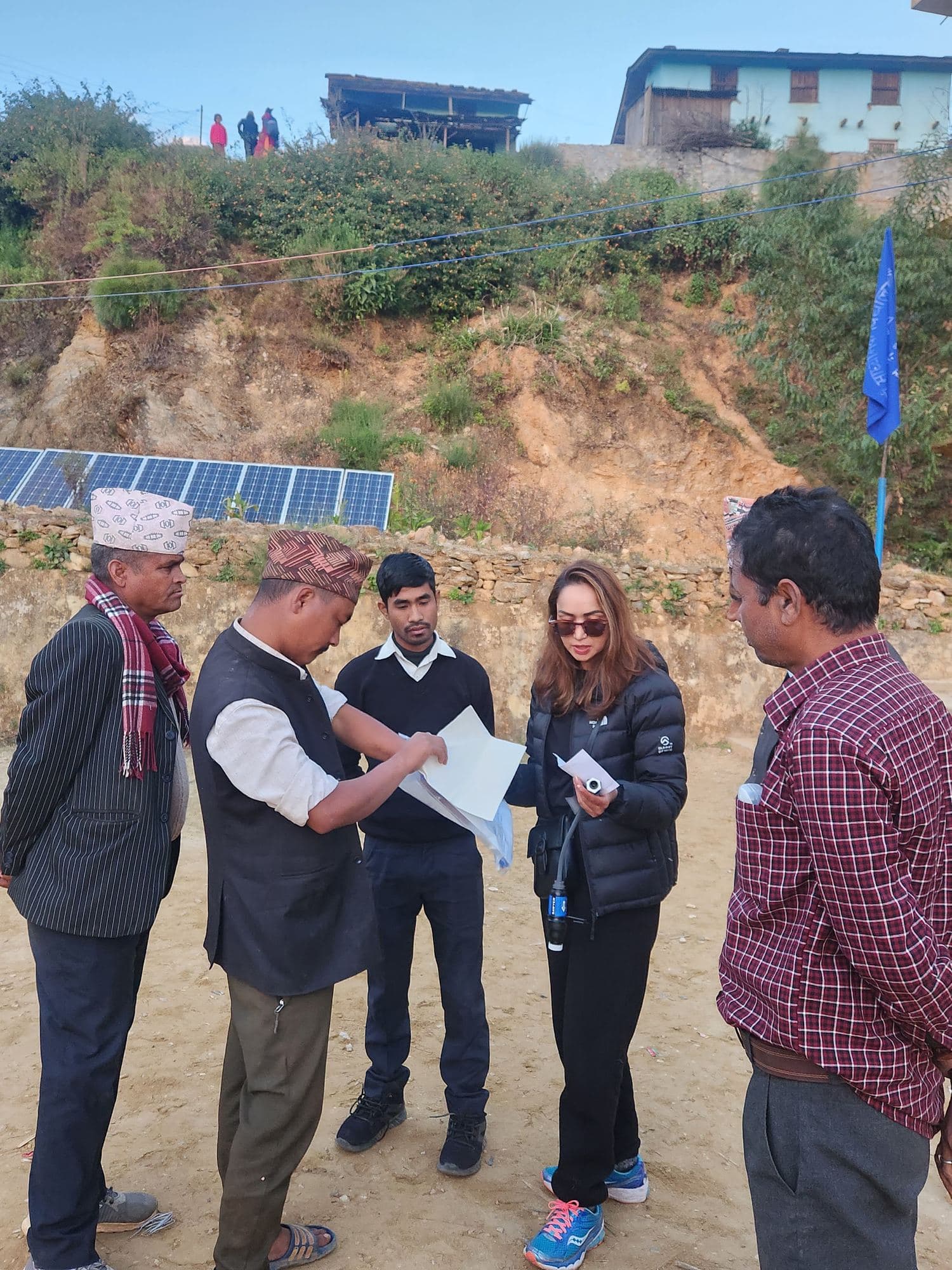 Going through the plans with local teachers and officials