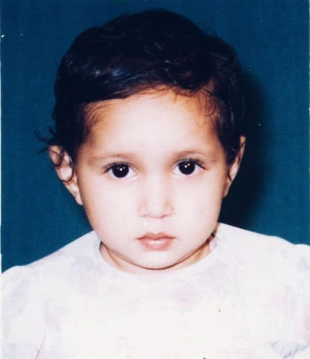 Pooja as a toddler, studio portrait