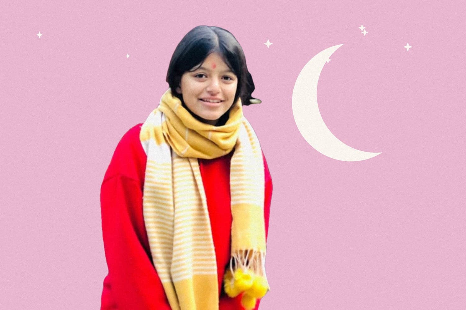 Neharika smiling in a yellow scarf