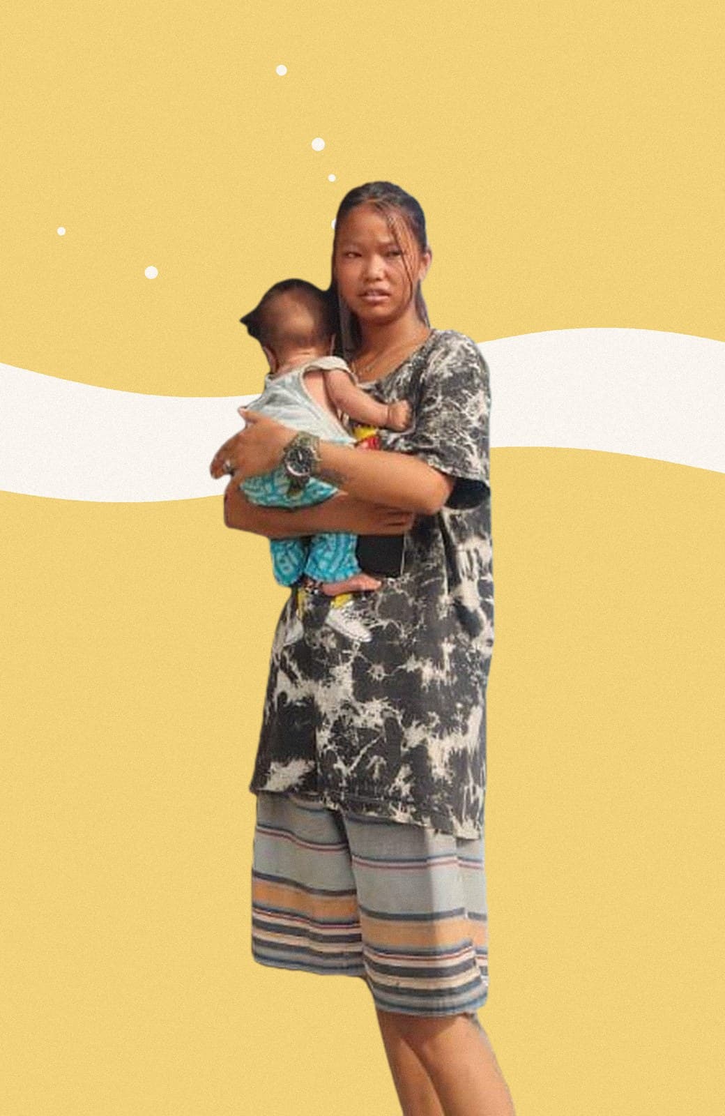 Sushmita holding her baby